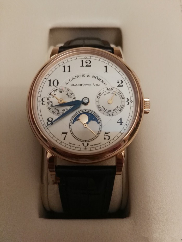 Blue hands on the white dials are quite obvious.
