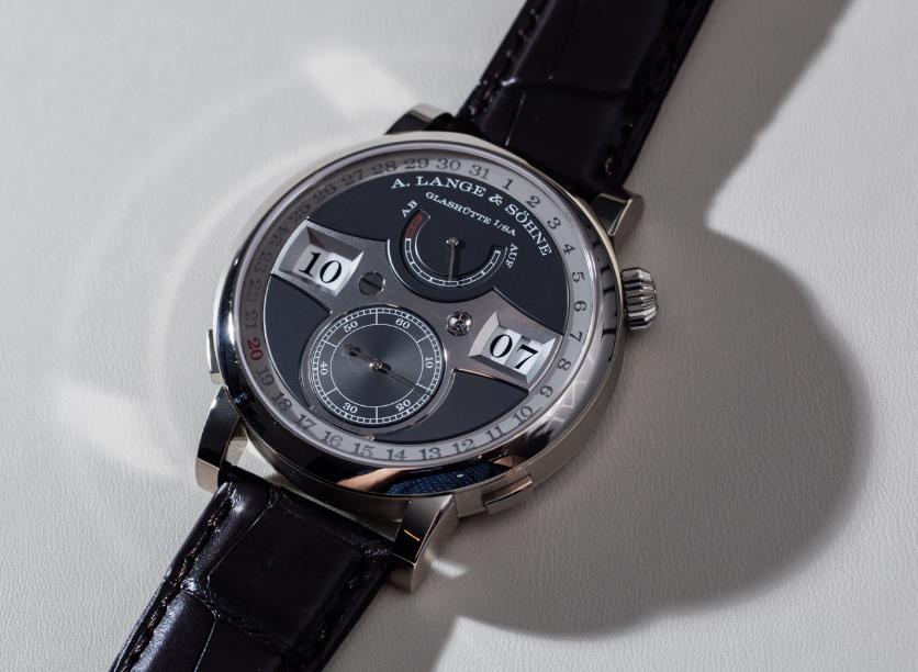 The black leather straps copy watches have grey dials.