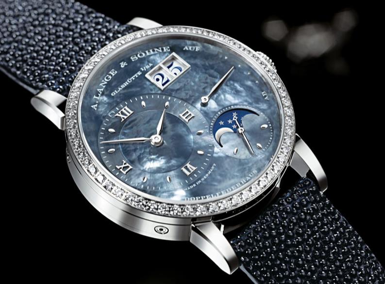 The blue dials fake watches are decorated with diamonds.