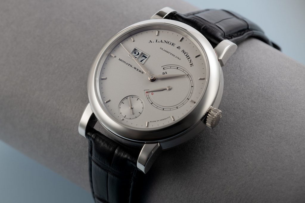 The silvery dials fake watches are designed for men.