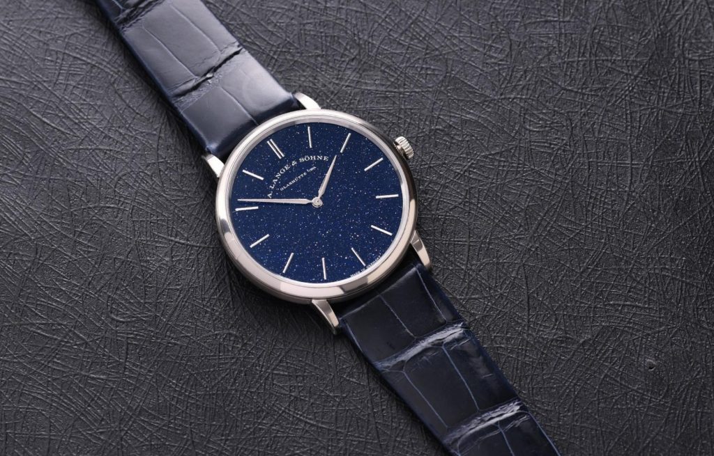 The 18k white gold fake watch has a blue dial.